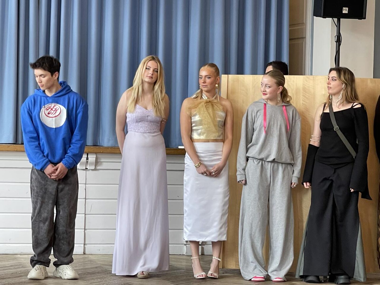 Line-up of models in student-made garments